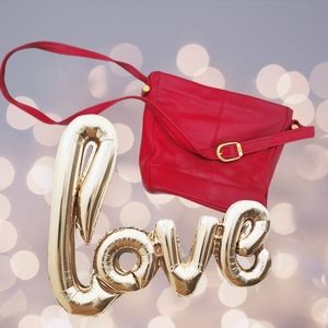 Red leather handbag